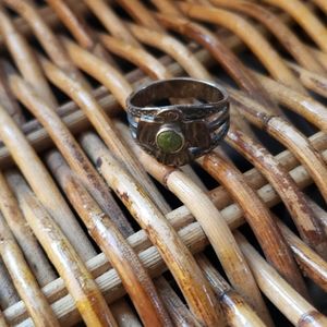 Pinky ring bird with green stone